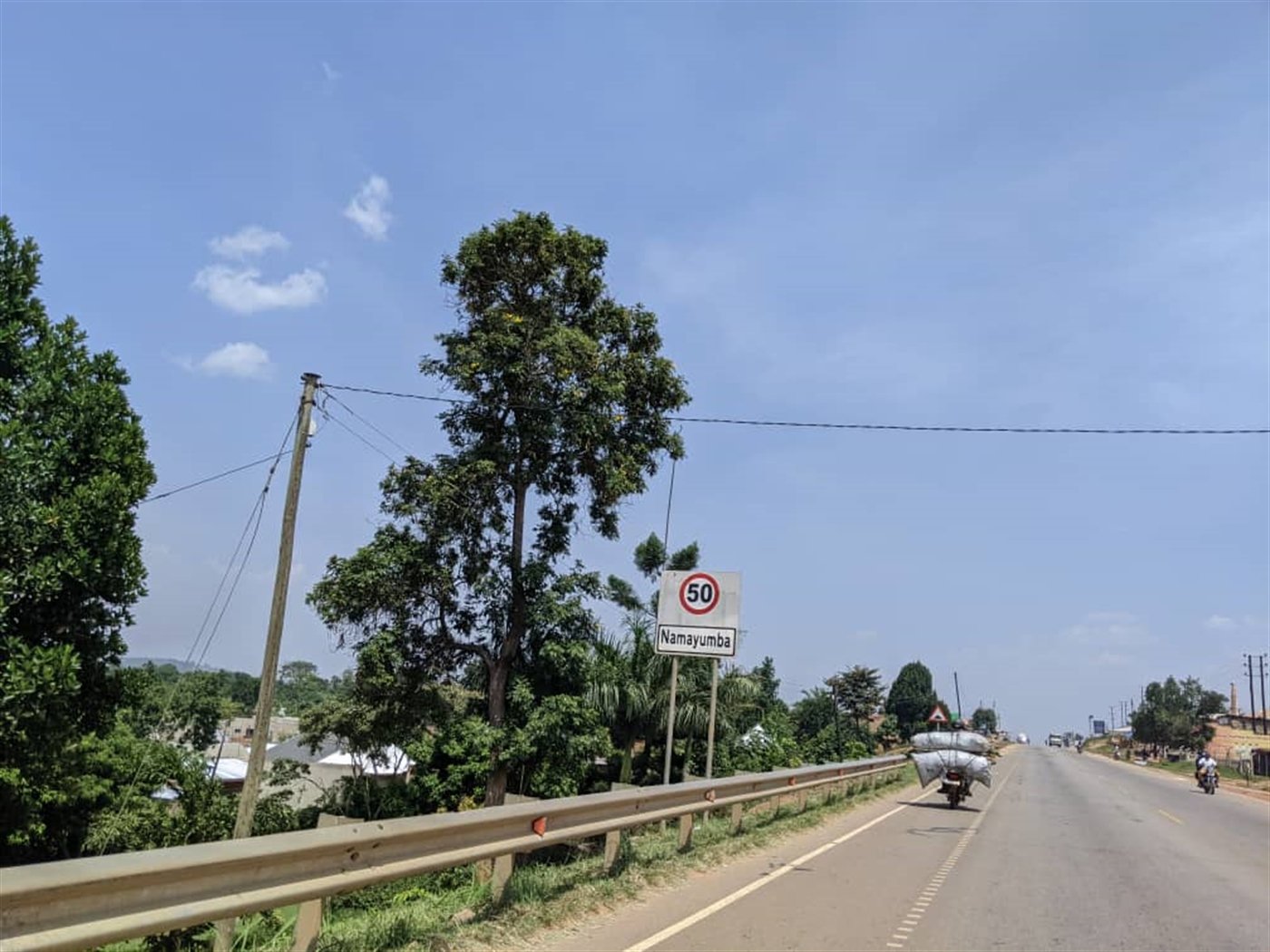 32 Uganda road driving and speed limit sign