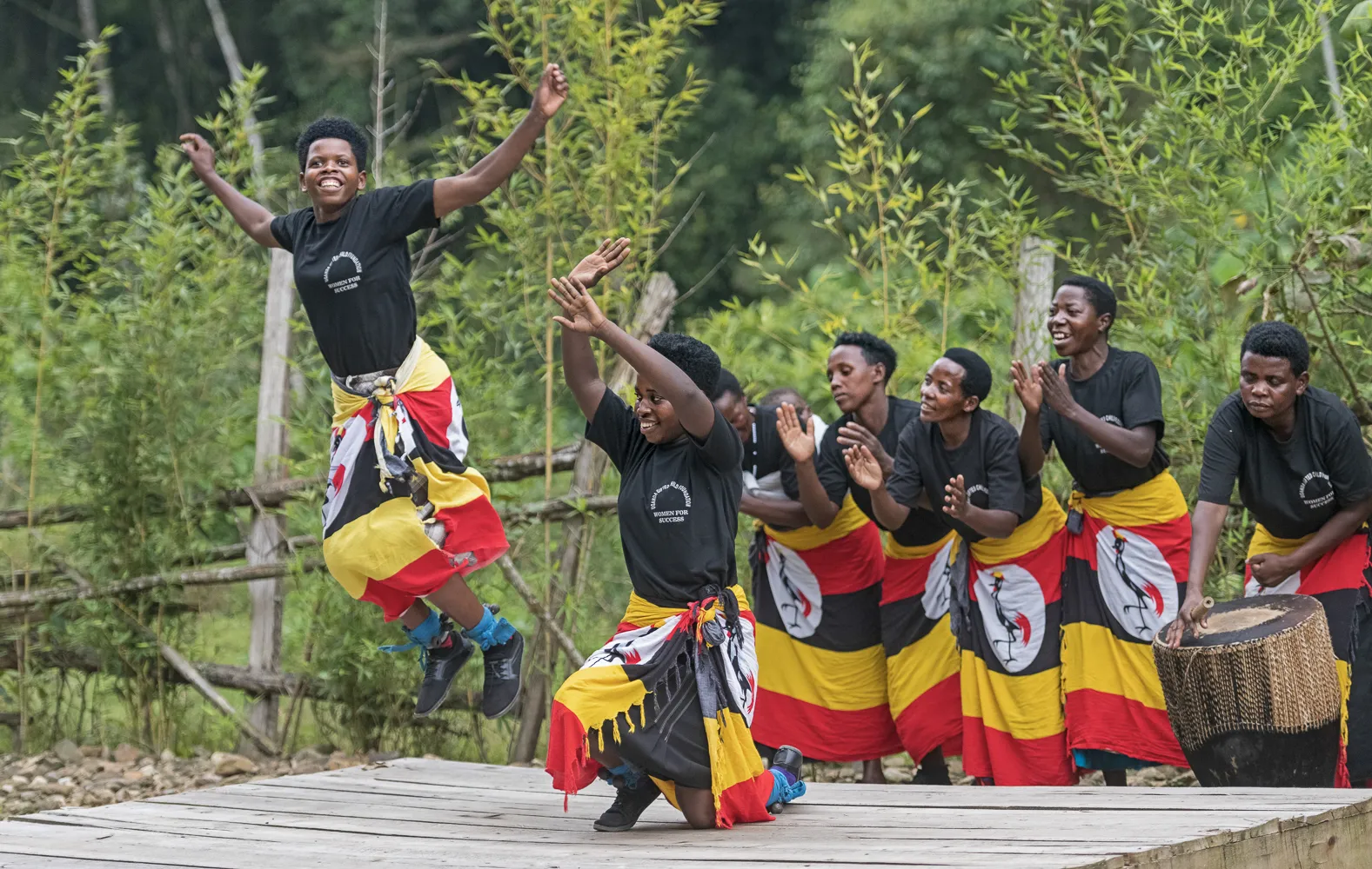 7 Day Uganda Safari: Best Wildlife Safari Tour 2026/2027 21 Ugandan women performing traditional dance and drumming during a community cultural experience in Uganda
