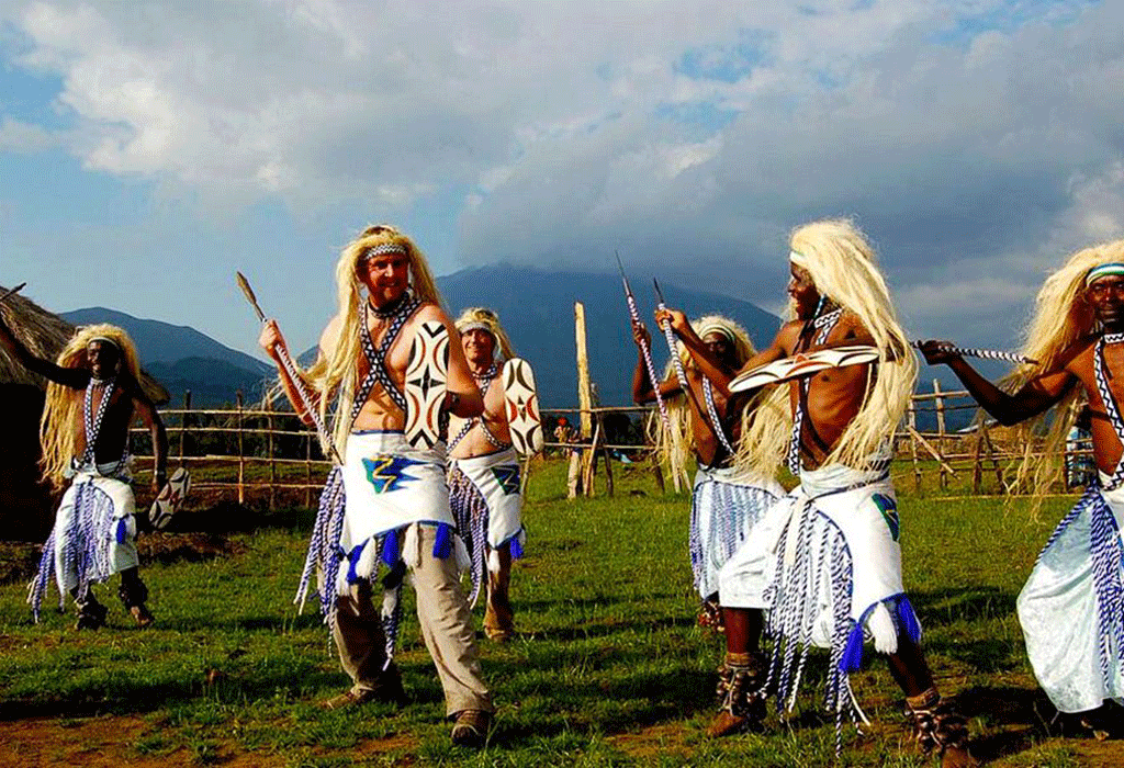 Traditional Rwandan Intore dancers performing in cultural attire during a Rwanda cultural safari experience