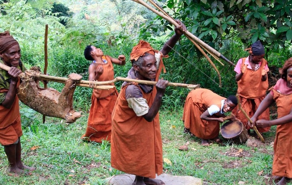 Best time for Gorilla trekking Uganda 23 Local community members performing traditional activities during a cultural experience combined with gorilla trekking in Uganda