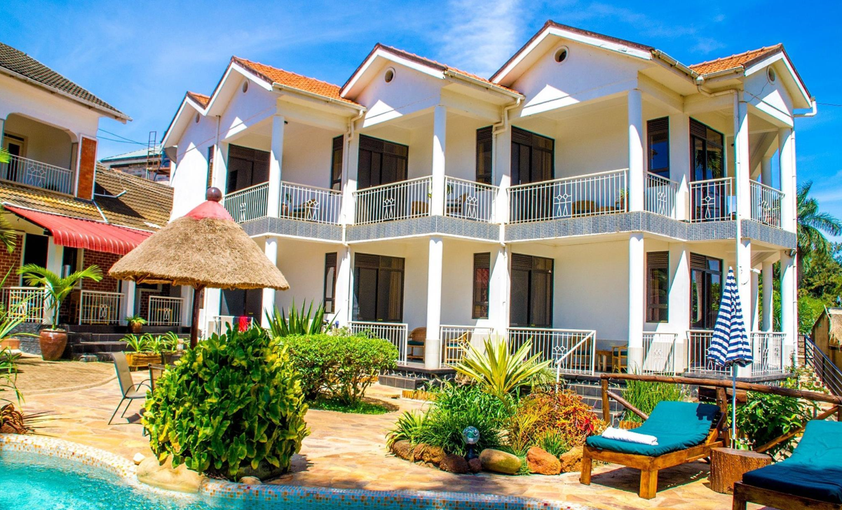 Ultimate Uganda Airport Guide: Best Travel Tips (2026/2027) 23 Comfortable hotel accommodation with balconies, garden and swimming pool for travelers arriving late at Entebbe International Airport, Uganda