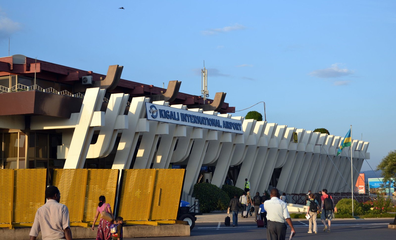 Ultimate Uganda Airport Guide: Best Travel Tips (2026/2027) 13 Travelers outside Kigali International Airport in Rwanda, a convenient arrival point for onward safaris to Uganda