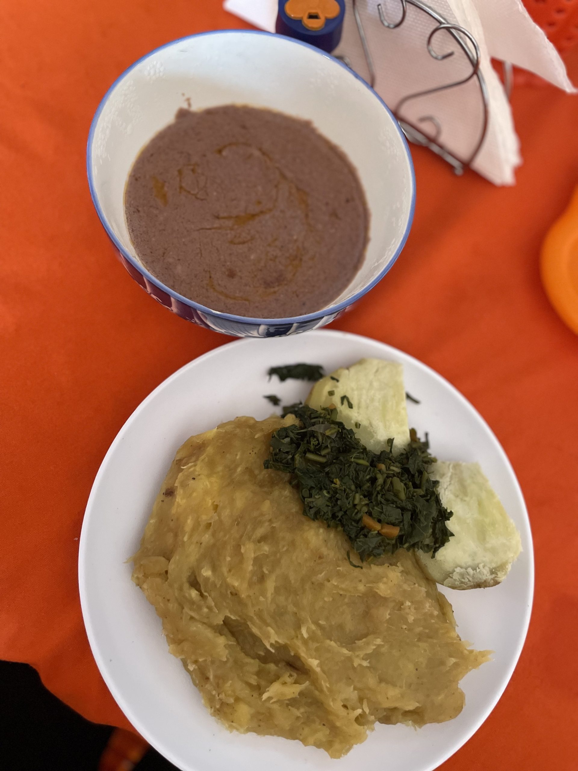 Uganda Food Guide 127 Ugandan vegetarian meal with groundnut stew, matooke, sweet potatoes and leafy vegetables