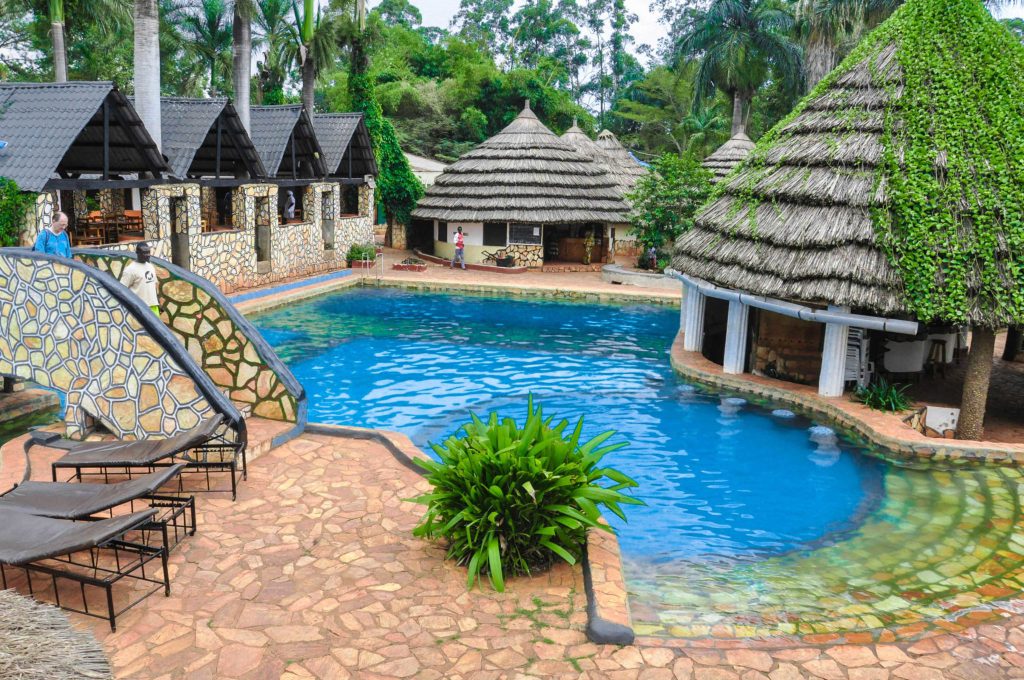 Ultimate Uganda Airport Guide: Best Travel Tips (2026/2027) 27 Mid-range hotel in Entebbe with swimming pool, tropical gardens and comfortable accommodation for Uganda safari travelers