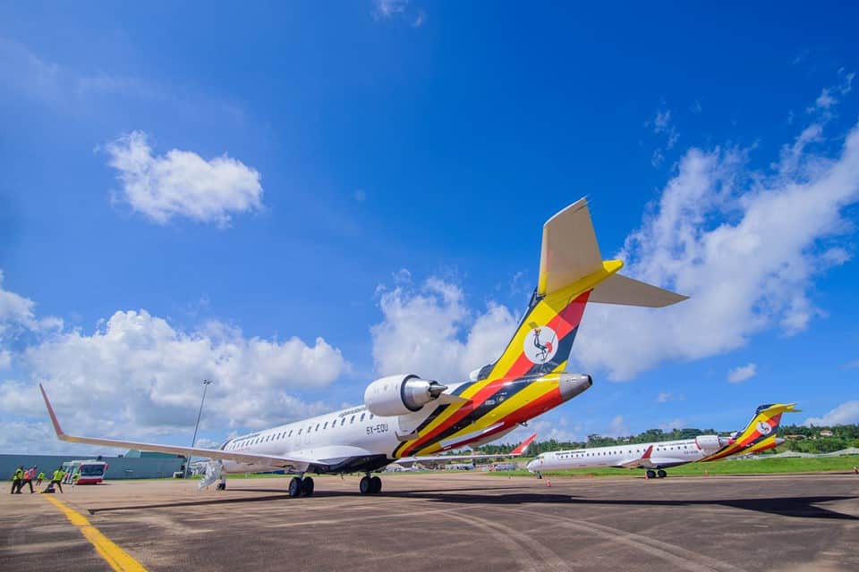 Ultimate Uganda Airport Guide: Best Travel Tips (2026/2027) 1 Uganda Airlines aircraft parked on an airport apron representing domestic and regional air travel connections in Uganda