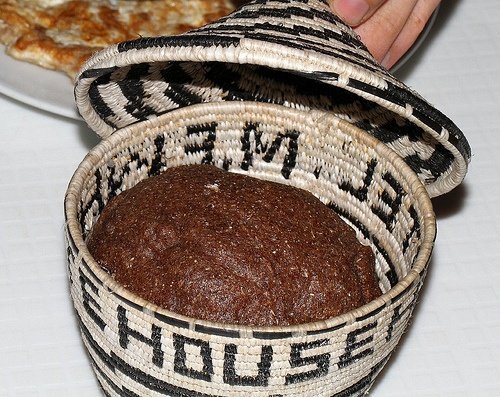 Uganda Food Guide 21 Traditional Ugandan kalo millet food served in a woven basket