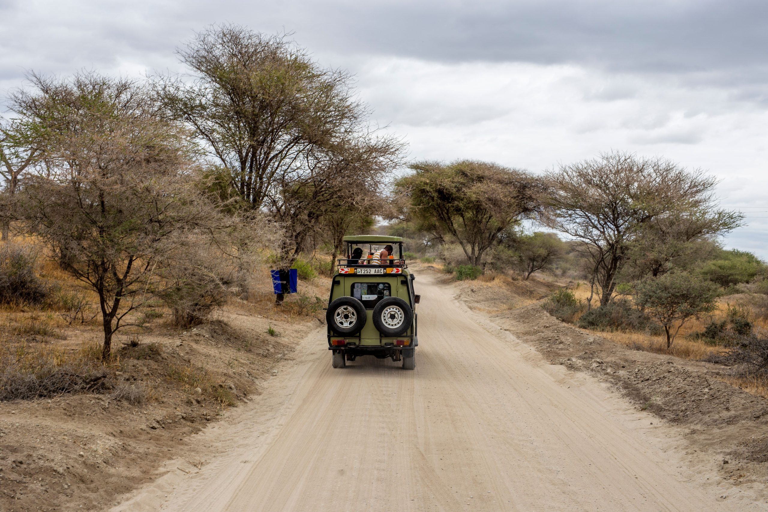 Best Unforgettable Gorilla Trekking Adventures You Can't Miss in 2026/2027 11 Safari vehicle and travelers beginning a gorilla trekking safari itinerary in Uganda's Bwindi Impenetrable National Park.