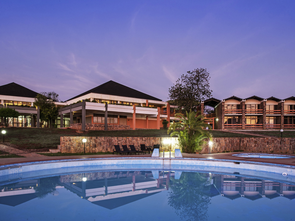 2-day Akagera National Park safari 7 Swimming pool and accommodation buildings at Mantis Akagera Game Lodge in Rwanda