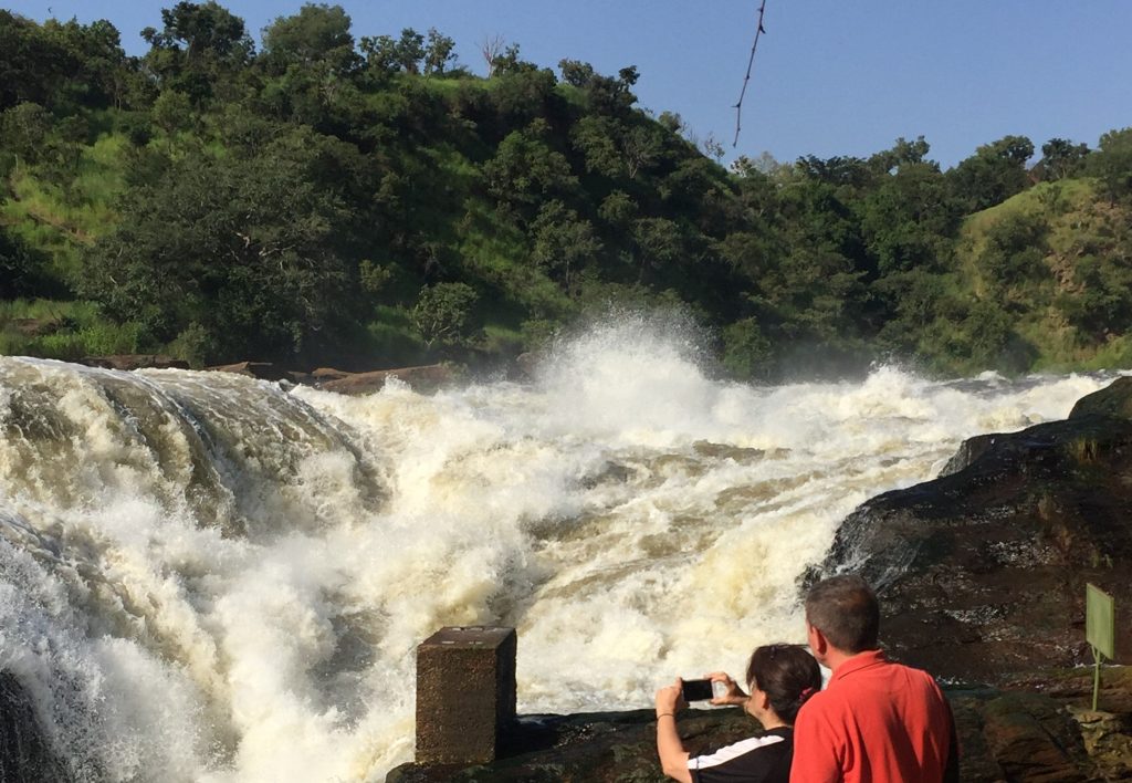 Murchison Falls Safari from China 1 Travelers photographing Murchison Falls during a Murchison Falls Safari from China in Uganda