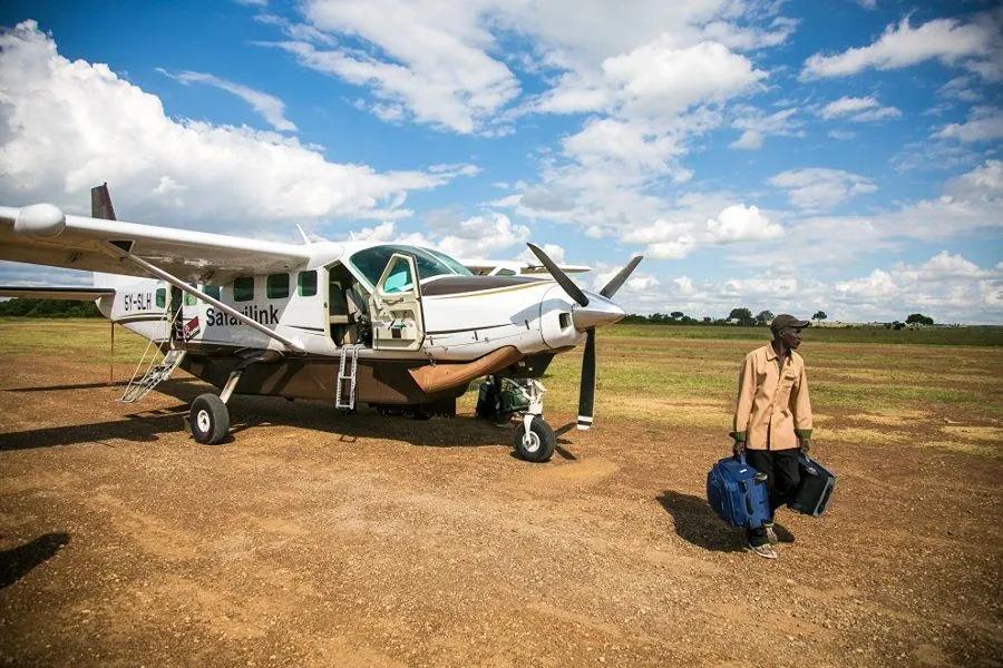 Travelers arriving in Uganda and preparing for gorilla trekking in Bwindi